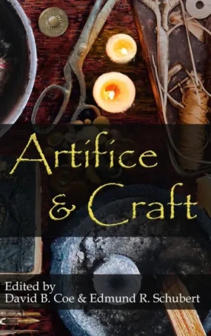 book cover for anthology, "Artifice & Craft;" cover image is of various objects on a deep red tablecloth: lit tealights, old-fashioned scissors, a mortar and pestler